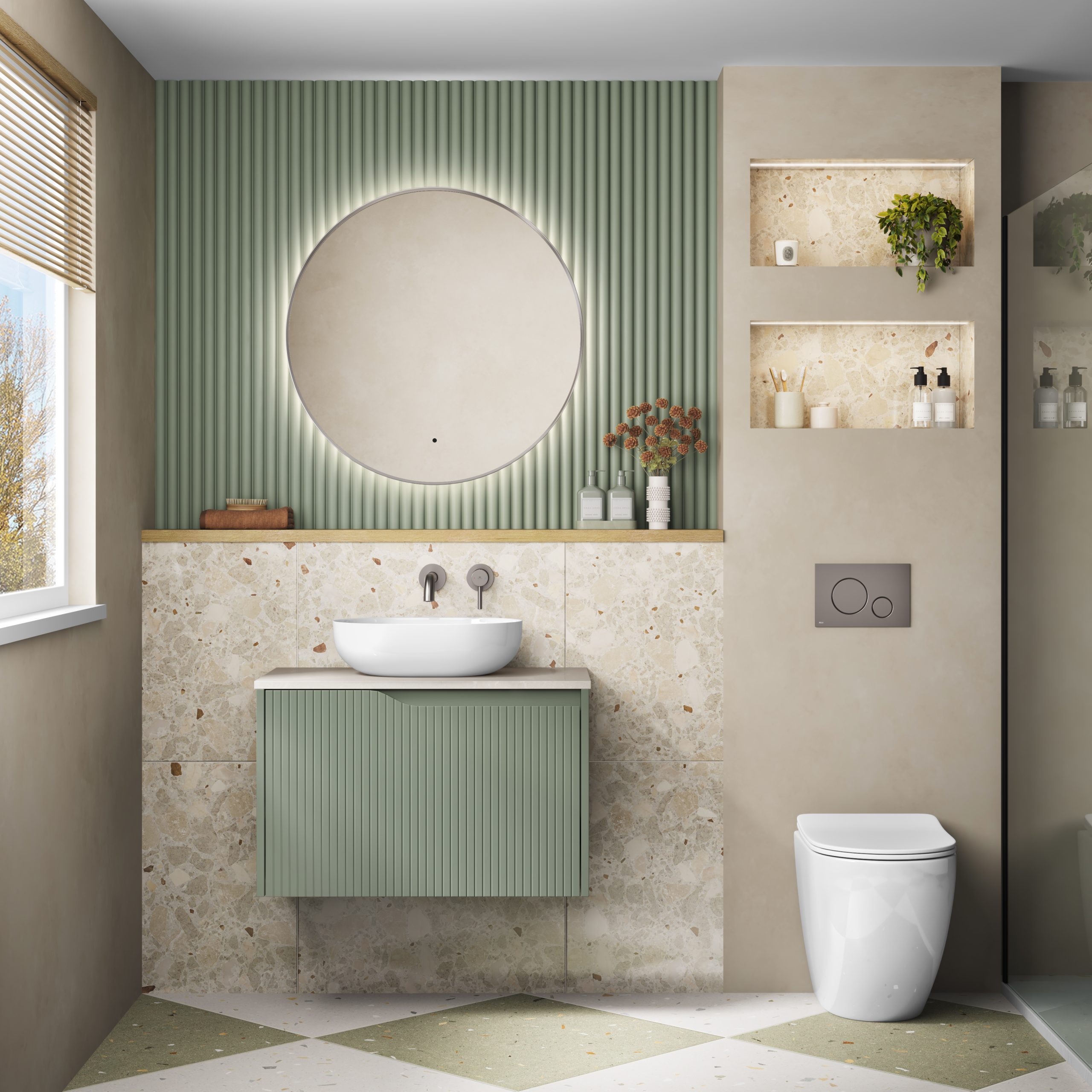 bathroom sink with green cabinet, an led mirror and next to it a white toilet