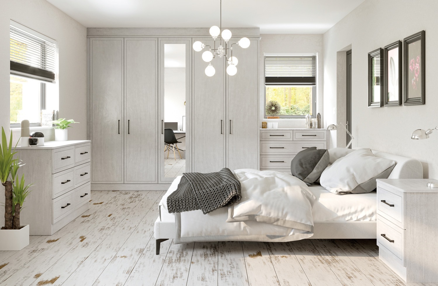 white bedroom with mirrors built into wardrobes